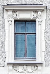Fototapeta na wymiar Rectangular window on a gray wall.