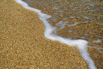 Geometric composition created by the waves of the sea in the Cyclades Islands
