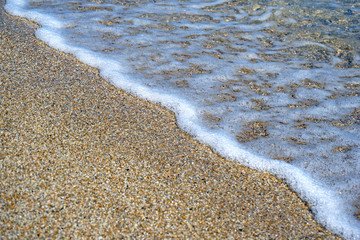 Geometric composition created by the waves of the sea in the Cyclades Islands