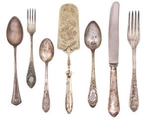 Vintage Antique silverware isolated on white background.  Retro.
