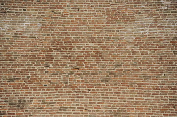Old brick wall background made of red bricks