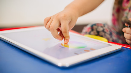 Kids using tablet for drawing : Some research says entertainment media (including TV) be avoided...