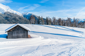Fototapeta premium Winter landscape with with snow covered Alps in Seefeld in the Austrian state of Tyrol. Winter in Austria