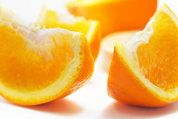 Close up slice part of oranges on white background