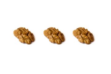  walnuts on a white background.  banner about diet and healthy eating