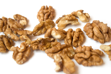  walnuts on a white background.  banner about diet and healthy eating