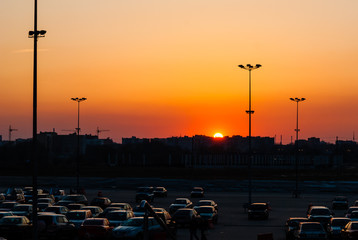 Fototapeta na wymiar Sunset at the mall parking lot