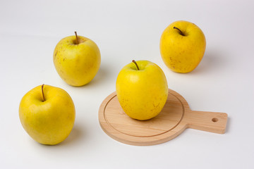 Yellow apples isolated on white background