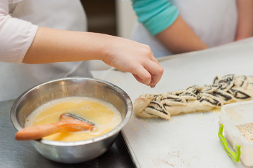 Manufacture of dough products. Hands closeup