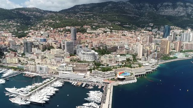 Aerial from helicopter of Monaco is sovereign city state country and microstate on French Riviera in Western Europe with France borders on three sides while the other side with the Mediterranean Sea 4