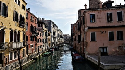Canal and venetian houses in its typical architecture in Venice, Italy.