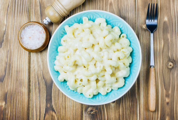 Mac and cheese, american style macaroni pasta with cheesy sauce