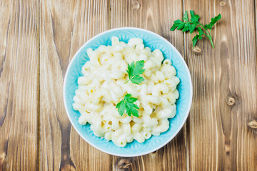 Mac and cheese, american style macaroni pasta with cheesy sauce