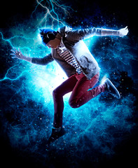 Fototapeta na wymiar Man break dancing on electricity light background