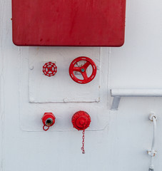 In case of fire, bulkhead equip with water hose and connections for fighting a fire on ship