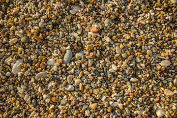 colorful shoreline stones background texture wallpaper pattern surface from above