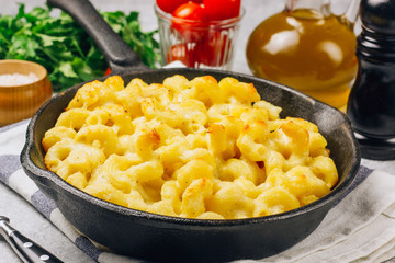 Mac and cheese, american style macaroni pasta with cheesy sauce