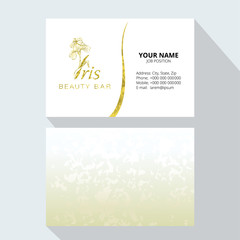 Iris flower logo in the style of engraving. Beauty logo.  Beauty Bar. Vector business cards design template. Romantic design for natural cosmetics, perfume, women products.