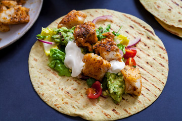 Fish tacos with spicy cod and avocado