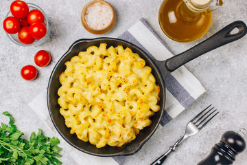 Mac and cheese, american style macaroni pasta with cheesy sauce