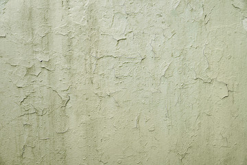 Old grey cracked painted wall background texture