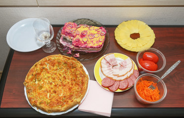 Appetizers are on table prepared for office party.