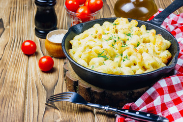 Mac and cheese, american style macaroni baked pasta with cheesy sauce in pan