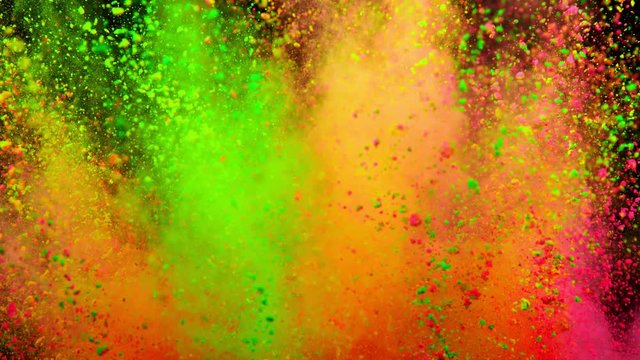 Colorful powder exploding on black background in super slow motion, shot with Phantom Flex 4K