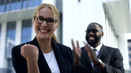 Excited businesswoman celebrating successful startup, personal and career growth