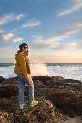 woman on the sea at sunset