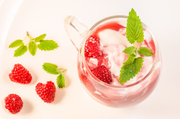 Health and diet concept/Healthy breakfast - yogurt with raspberry and mint, top view