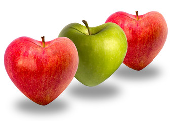 Three apples, red and green, heart shaped, isolated on white background