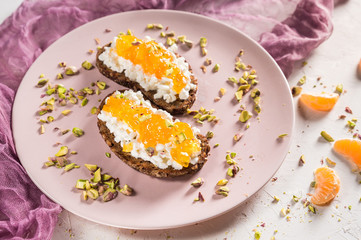 Sandwich with cottage cheese and orange jam