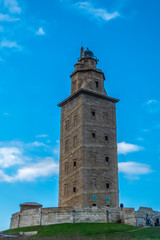 Obraz premium The Tower of Hercules, an ancient Roman lighthouse on a peninsula about 2.4 kilometers (1.5 mi) from the centre of A Coruna (Corunna), the second largest city in Galicia, Northwestern Spain.