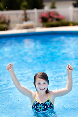 Excited Little Girl in Swimming Pool