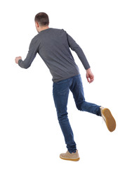 back view of running  man.