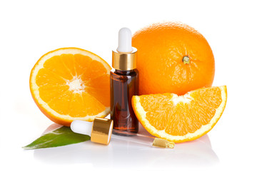 Orange essential oil isolated on white background. Orange oil for skin care, spa, wellness, massage, aromatherapy and natural medicine. Citrus oil
