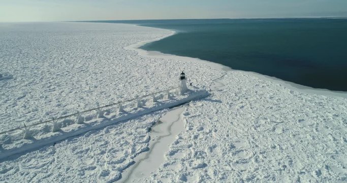 Aerial of Frozen Lighthouse and the Sea
