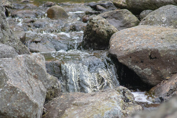 water flowing over rocks
