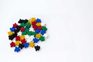 Groups of colorful meeples isolated on white background. Blue, red, black, green and yellow. Small figures of man. Board games concept. . Business strategy. Components of card games.