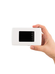 Portable usb router on a white background. 4g router in hand on a white background.