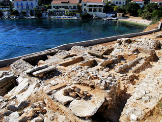 Roman cemetery of Fiskardo, ancient roman grave ruins in picturesque and iconic port of Fiskardo, Kefalonia island, Ionian, Greece 