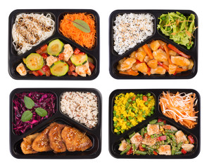Set of containers with healthy cooked lunch isoalted on white background