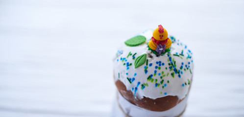 Easter cake on a white wooden background