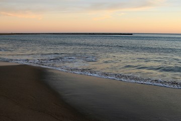 Waves on the beach coast summer heat blue sky sunset water Mediterranean Spain