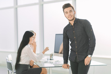 young business man standing in his office