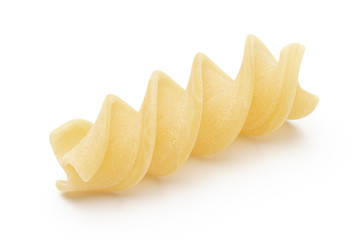 Italian twisted pasta fusilli isolated on white background. Fusilloni, rotini.