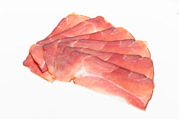 Hamon sliced on white background. Spanisch traditional meat.