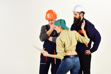 Discussing a new project. Group of constructing engineers and architects at work. Professional...