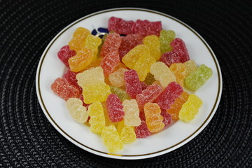 teddy gelatin,gummies,gummi bears on a porcelain plate